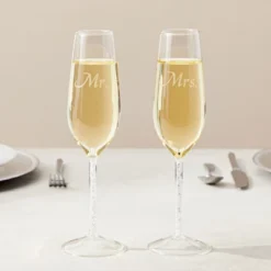 Juvale Set Of 2 'Mr And Mrs' Champagne Toasting Flutes For Bride And Groom, Wedding Wine Glasses For Newlyweds, Engagement Gifts -Anagram Shop GUEST e8e9e000 9f08 4070 a682 408f29fcc1d4